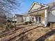 Backyard patio featuring outdoor furniture and an overhanging awning at 3465 Caldwell Ridge Pkwy, Charlotte, NC 28213