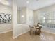 Bright breakfast nook with a view of the front yard at 3465 Caldwell Ridge Pkwy, Charlotte, NC 28213