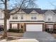 Charming two-story townhouse with a well-manicured lawn and a two car garage at 3465 Caldwell Ridge Pkwy, Charlotte, NC 28213