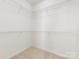 Walk-in closet with built-in shelving providing ample storage at 3465 Caldwell Ridge Pkwy, Charlotte, NC 28213