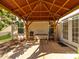 Covered patio featuring outdoor dining, a serene space perfect for entertaining at 3628 Benseval Ln, Matthews, NC 28104
