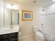 Bathroom with a soaking tub, single vanity, and a neutral color palette at 3628 Benseval Ln, Matthews, NC 28104