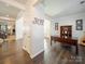 Spacious foyer with hardwood floors, offering an inviting view into other living spaces at 3628 Benseval Ln, Matthews, NC 28104