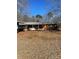 Charming one-story brick home with a cozy front porch and a well-manicured lawn at 37254 Barnhardt Rd, New London, NC 28127