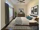 Cozy bedroom with natural light, modern décor, and stylish furnishings at 404 N Laurel Ave # 28, Charlotte, NC 28204