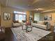 Bright living room featuring modern furniture, artwork, and large windows for abundant natural light at 404 N Laurel Ave # 28, Charlotte, NC 28204