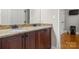 Bathroom with double sinks, granite counters, and modern fixtures at 4893 River Hills Dr, Denver, NC 28037