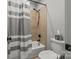 Bathroom featuring a tiled shower, tub, and modern fixtures at 4893 River Hills Dr, Denver, NC 28037