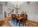 Formal dining room with a coffered ceiling and traditional furnishings at 4893 River Hills Dr, Denver, NC 28037