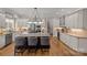Spacious kitchen features an island with seating and stainless steel appliances at 4893 River Hills Dr, Denver, NC 28037