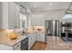 Kitchen with stainless steel appliances, granite countertops, and hardwood floors at 4893 River Hills Dr, Denver, NC 28037