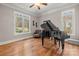 Living room with a grand piano at 4893 River Hills Dr, Denver, NC 28037