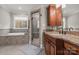Luxurious main bathroom featuring a soaking tub, glass enclosed shower and granite countertop at 4893 River Hills Dr, Denver, NC 28037
