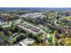 Panoramic aerial showcasing a residential community surrounded by mature trees at 505 2Nd Street Ne Pl # G-3, Conover, NC 28613