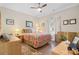 Bedroom with a large bed, hardwood floors, and natural light from the window at 505 2Nd Street Ne Pl # G-3, Conover, NC 28613