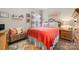 Comfortable bedroom featuring a bed, a seating bench, and a window at 505 2Nd Street Ne Pl # G-3, Conover, NC 28613
