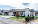 Inviting home exterior featuring a well-manicured lawn and attached garage at 505 2Nd Street Ne Pl # G-3, Conover, NC 28613