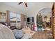 Cozy living room with hardwood floors, large windows, and an open archway to another room at 505 2Nd Street Ne Pl # G-3, Conover, NC 28613