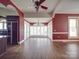 Expansive living room with hardwood floors, abundant natural light, and an open layout towards kitchen at 505 Camden Rd, Wadesboro, NC 28170