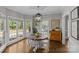 Cozy breakfast nook with natural light, wood floors, and decor at 5618 Camilla Dr, Charlotte, NC 28226