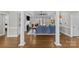 Bright living room with a vaulted ceiling, fireplace, and access to the backyard at 5618 Camilla Dr, Charlotte, NC 28226