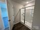 Bathroom featuring a glass-enclosed shower with a rain shower head and a sleek design at 588 N Sparkleberry Ln, Chester, SC 29706