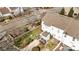 Birds eye view of a backyard featuring a fire pit, patio, basketball hoop, and green grass at 6057 Creft Cir, Indian Trail, NC 28079