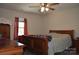 Bedroom with a comfortable bed, wood furniture, natural light for a relaxing ambiance at 648 E Ketchie St, China Grove, NC 28023