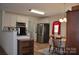 Bright kitchen with stainless steel appliances and a cozy dining area at 648 E Ketchie St, China Grove, NC 28023
