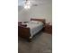 Bedroom featuring hardwood furnishings, carpeted flooring, and a ceiling fan at 648 E Ketchie St, China Grove, NC 28023
