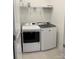 Laundry room equipped with a modern washer and dryer and wire shelving at 705 Hallman Branch Ln, Lincolnton, NC 28092