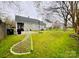 Spacious backyard with lush green grass, perfect for outdoor activities and relaxation at 7204 Cranswick Pl, Charlotte, NC 28227