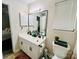 Bathroom featuring double sinks, modern fixtures, and a toilet with decor at 7204 Cranswick Pl, Charlotte, NC 28227