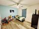 Comfortable bedroom with ceiling fan, and ample natural light at 7204 Cranswick Pl, Charlotte, NC 28227