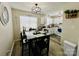 Cozy dining room with a rustic table, perfect for Gathering meals and gatherings at 7204 Cranswick Pl, Charlotte, NC 28227