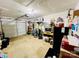 Spacious garage with ample storage shelves and a well-organized layout at 7204 Cranswick Pl, Charlotte, NC 28227