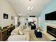 Stylish living room with a fireplace, comfortable seating, and an open design at 7204 Cranswick Pl, Charlotte, NC 28227