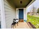 Inviting front porch featuring a cozy seating area and charming decor at 7204 Cranswick Pl, Charlotte, NC 28227
