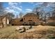 Spacious backyard with a cozy fire pit area, perfect for outdoor entertaining and relaxation at 7435 Trotter Rd, Charlotte, NC 28216