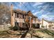 Lovely two-story home boasts a classic design with a brick accent, complemented by mature landscaping at 7435 Trotter Rd, Charlotte, NC 28216