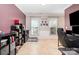 Home office with tile floors, ample natural light, and space for work and storage at 7435 Trotter Rd, Charlotte, NC 28216