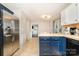 Stylish kitchen with stainless appliances, wooden countertops, and white cabinets at 7435 Trotter Rd, Charlotte, NC 28216