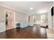 Spacious living room with hardwood floors, plenty of natural light, and a neutral color scheme at 7435 Trotter Rd, Charlotte, NC 28216