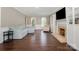 Bright and airy living room features hardwood floors, neutral walls, and a cozy fireplace at 7435 Trotter Rd, Charlotte, NC 28216