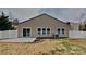 Spacious backyard with a sliding glass door and a patio area at 8055 Hereford St, Charlotte, NC 28213