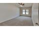 Spacious bedroom features neutral carpet, walls, and natural light from the double windows at 8055 Hereford St, Charlotte, NC 28213