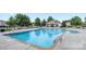Large community pool with lounge chairs and clubhouse for residents' enjoyment and relaxation at 8055 Hereford St, Charlotte, NC 28213