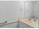 Bathroom with white sink, mirror and white walls at 8731 Sheltonham Way, Charlotte, NC 28216