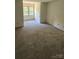 Bedroom featuring carpet, natural light and neutral colors at 8731 Sheltonham Way, Charlotte, NC 28216