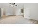 Bright bedroom with carpeted floors and neutral walls, ready for personalization at 8731 Sheltonham Way, Charlotte, NC 28216